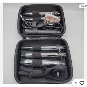 Amika brand new set. The Chameleon 5 Barrel Interchangeable Curling Kit Black